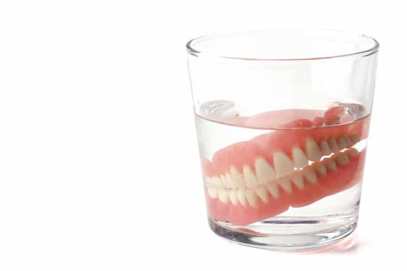 teeth in a glass