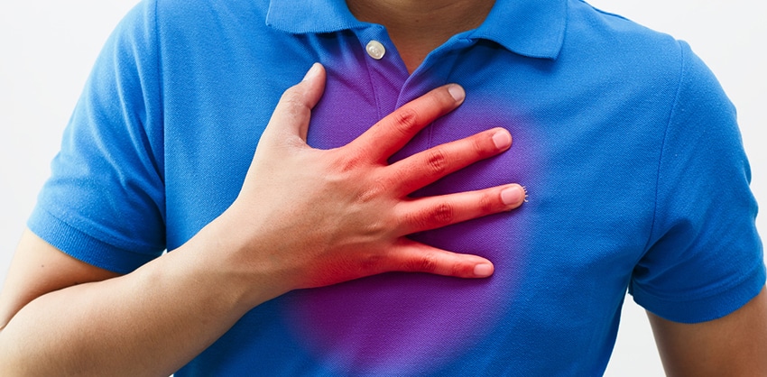 Man with symptoms of heartburn