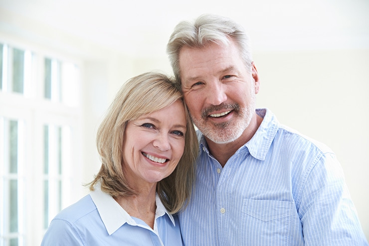 Mature adult couple smiling